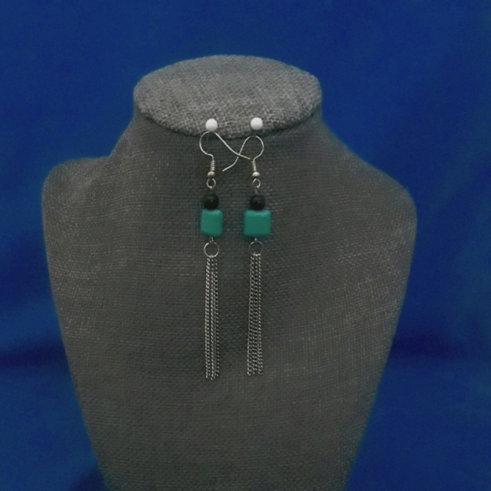 Dangling Turquoise earrings.